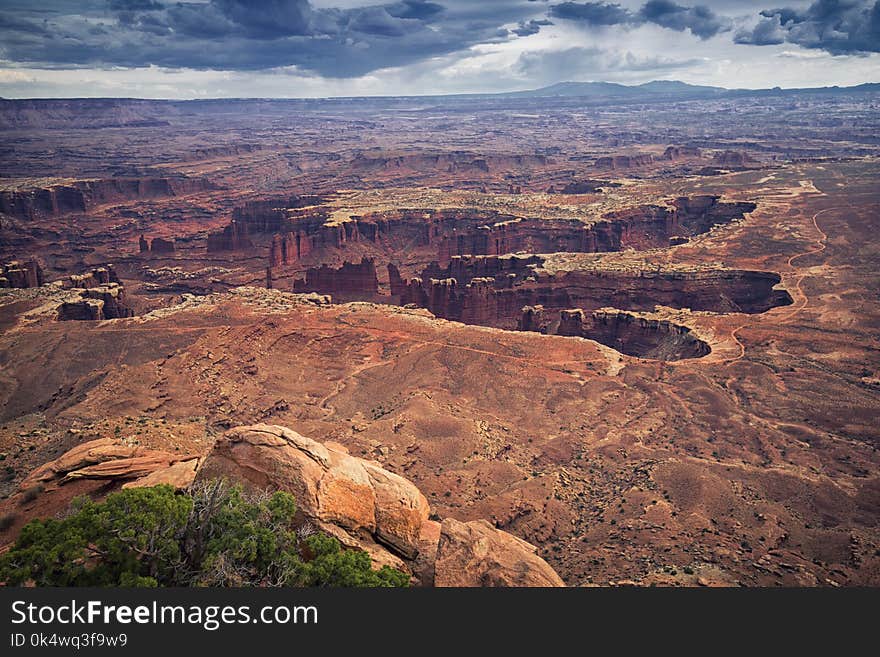 Canyonlands National Park erosion structure with clouds on sky, Utah, USA