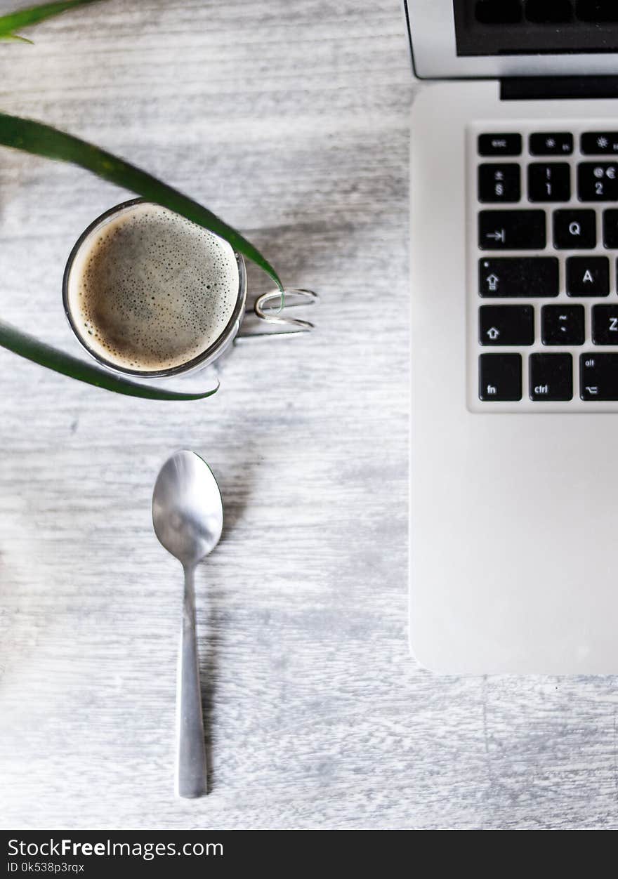 Photo of Coffee Beside Laptop