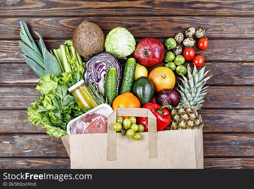 Natural Healthy Food in a paper bag. A set of natural products in the craft shop. Natural Healthy Food in a paper bag. A set of natural products in the craft shop.