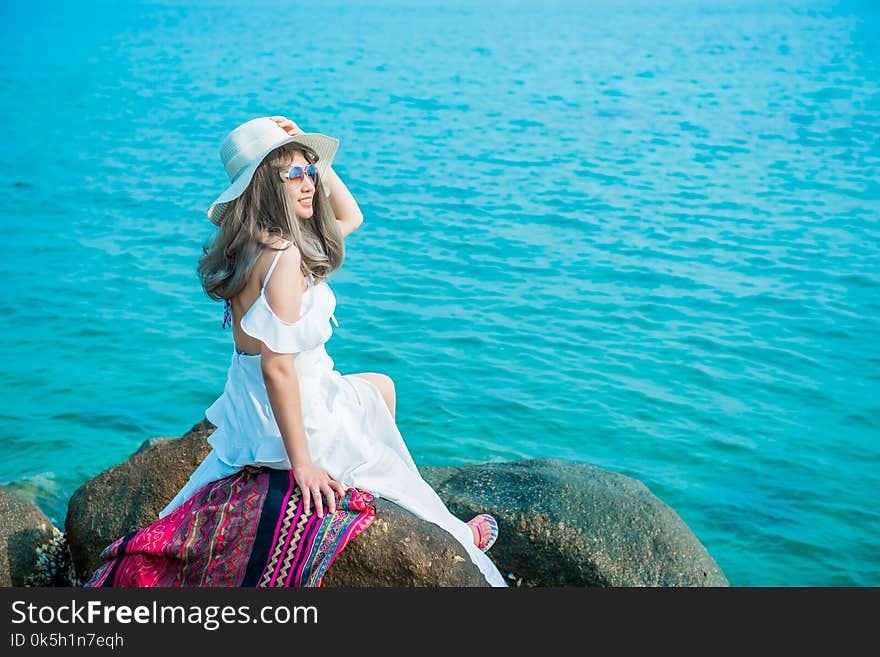 Women travel alone at the sea and beach on Summer. Vacation and relaxing, Chonburi Thailand. Women travel alone at the sea and beach on Summer. Vacation and relaxing, Chonburi Thailand.