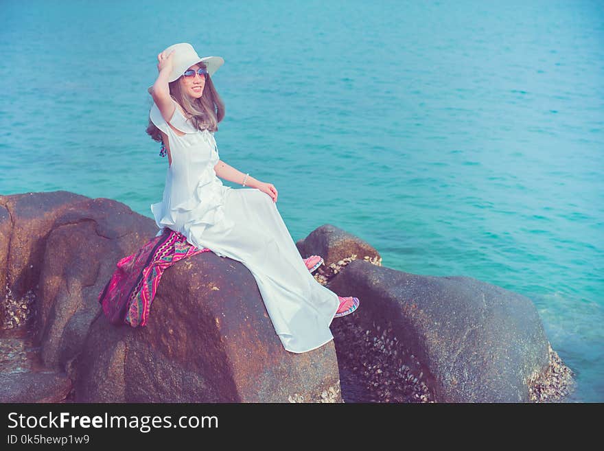 Women travel alone at the sea and beach on Summer. Vacation and relaxing, Chonburi Thailand. Women travel alone at the sea and beach on Summer. Vacation and relaxing, Chonburi Thailand.