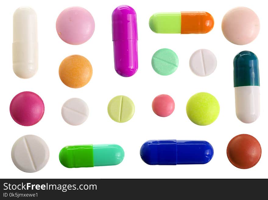 Multicolor pill capsule isolated on white background. Top view. Flat lay. Set or collection