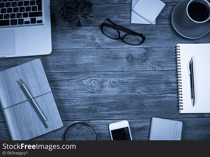 Office desk table with supplies. Top view. Copy space for text. Office desk table with supplies. Top view. Copy space for text