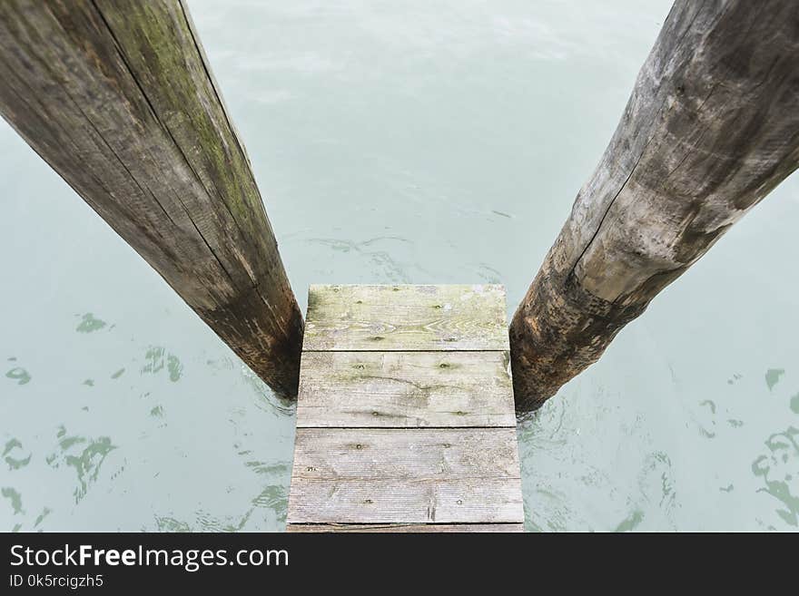 Wooden pier in water