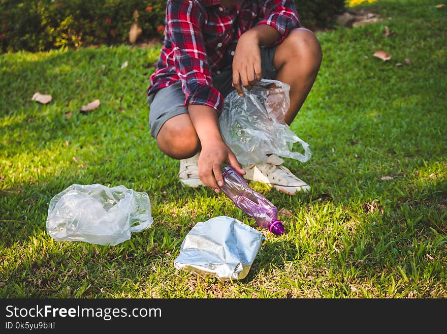 Child Volunteer Help Garbage Collection Charity.