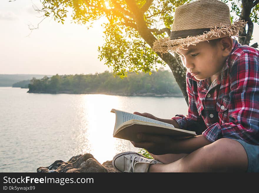 Men tourists education read books in quiet nature.