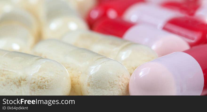 Close Up Of Probiotics And Antibiotics Capsules