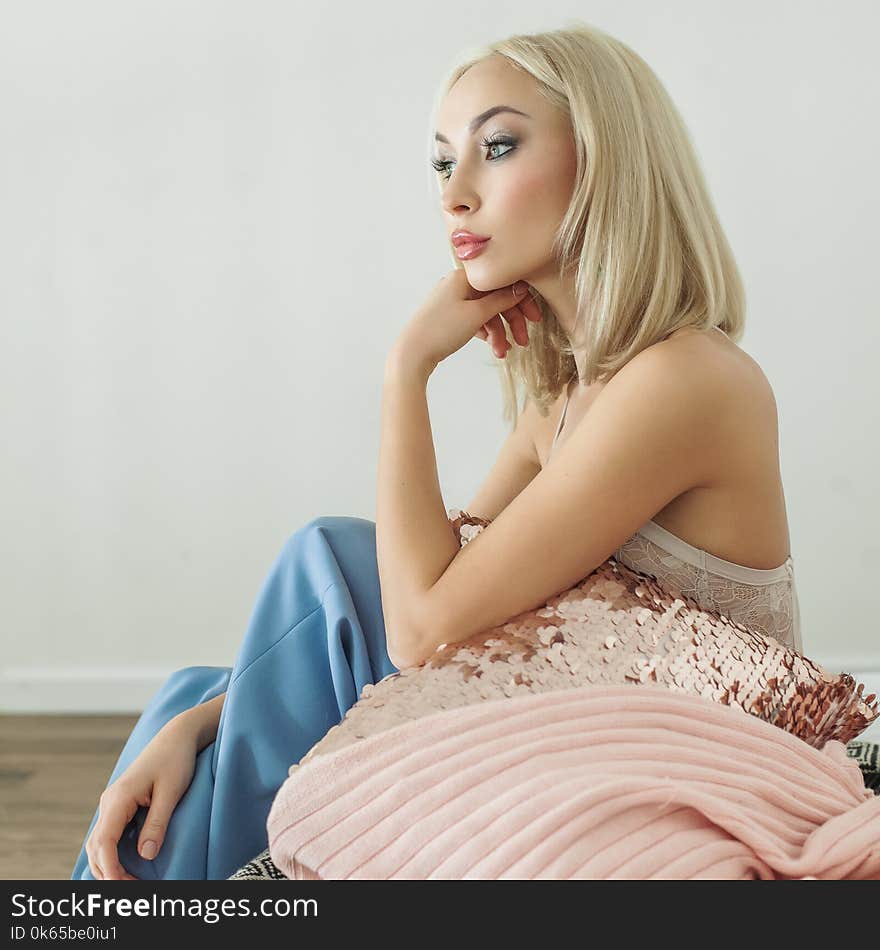 Beautiful woman relaxing and dreaming at home