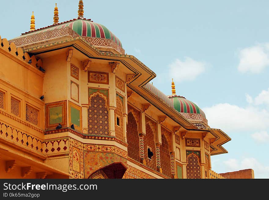 Brown and Multicolored Concrete Building