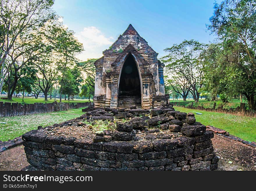 Gray Concrete Altar Between Green Trees