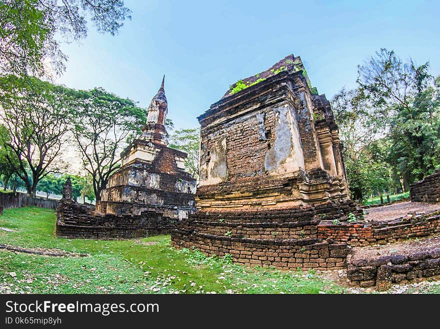 Brown and Gray Concrete Ruins Under Blue Sky at Daytime