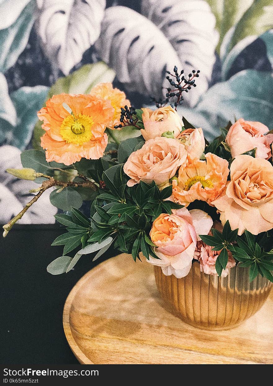 Peach Peony Flowers and Pink Poppy Flowers in Vase on Table Centerpiece