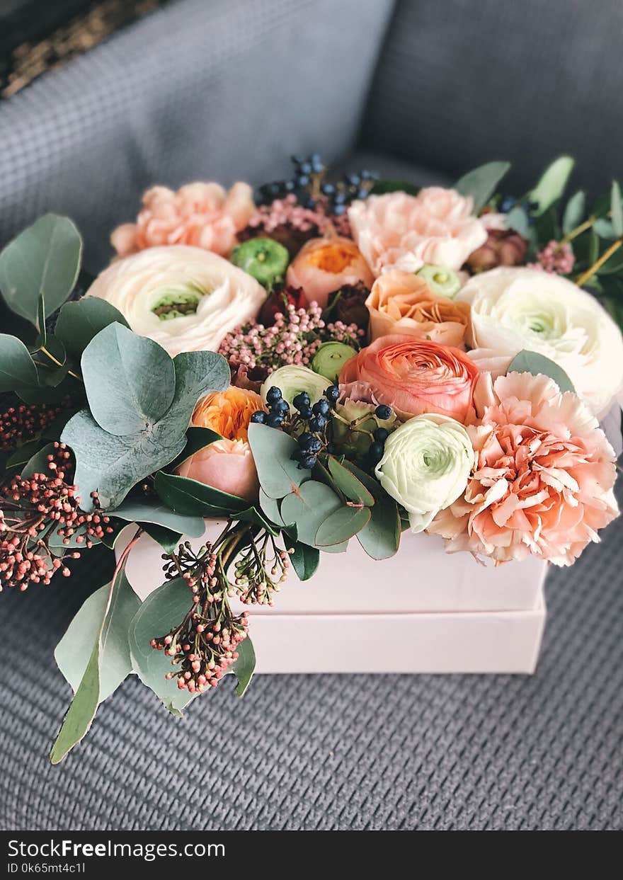 White, Orange, and Green Floral Bouquet Decor