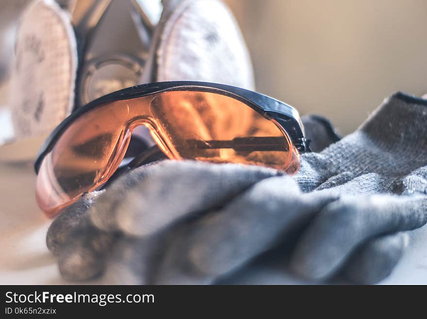 Closeup Photo of Black Framed Brown Sunglasses