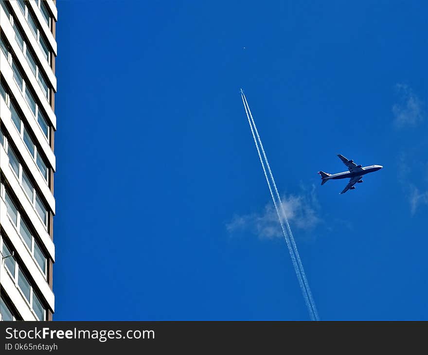 Grey Passenger Plane on Sky at Daytime