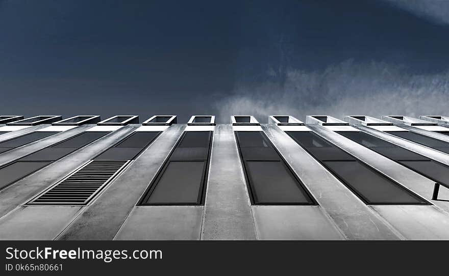 Low Angle of Grey Concrete Building