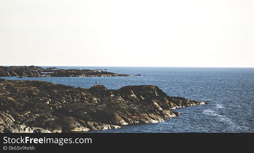 Landscape Photograph of Body of Water