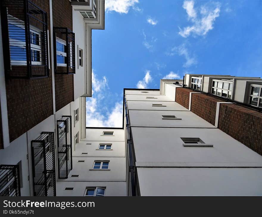 Worms Eyeview Photography of White and Brown Buildings