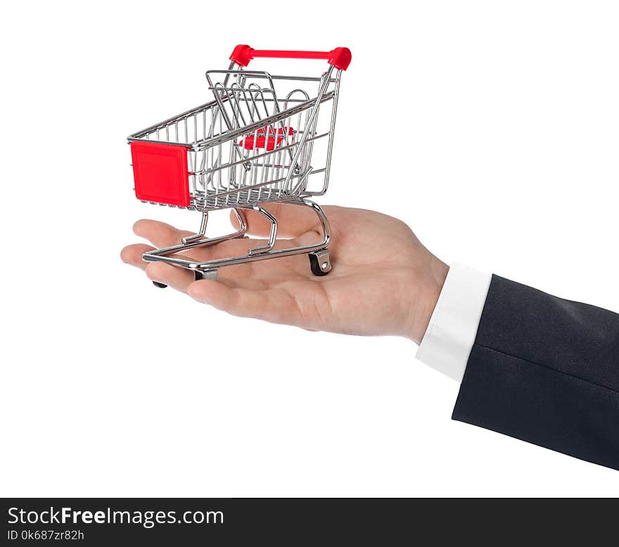 Hand with shopping cart isolated on white background