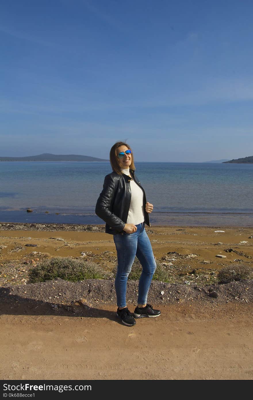 Beautiful Woman is looking at camera in Cunda Island,Turkey. Beautiful Woman is looking at camera in Cunda Island,Turkey