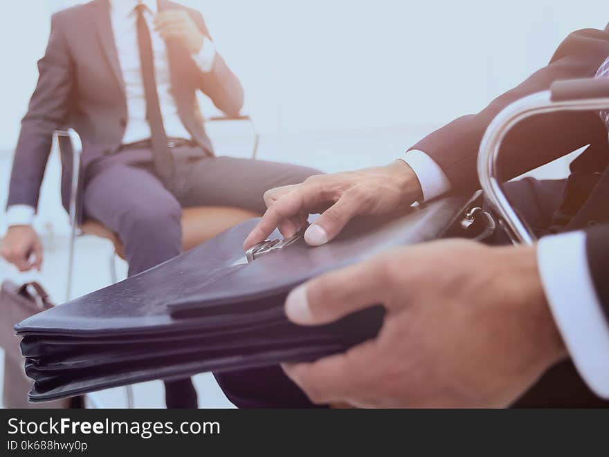 Elegant man in suit with briefcase