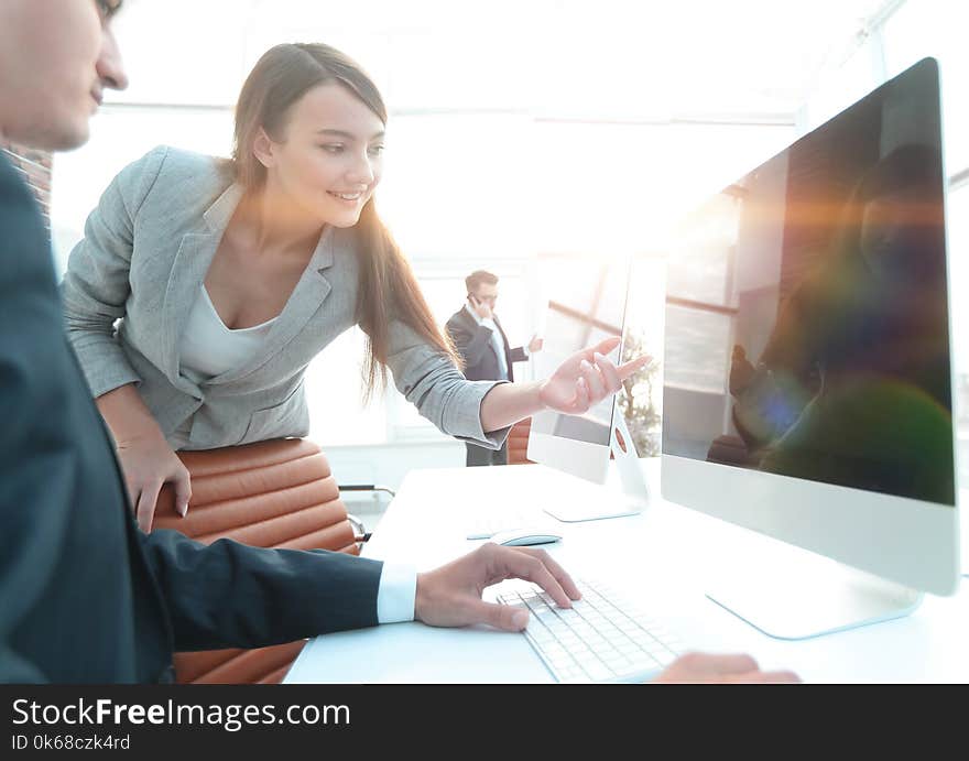 Business Woman Pointing At The Computer Screen.