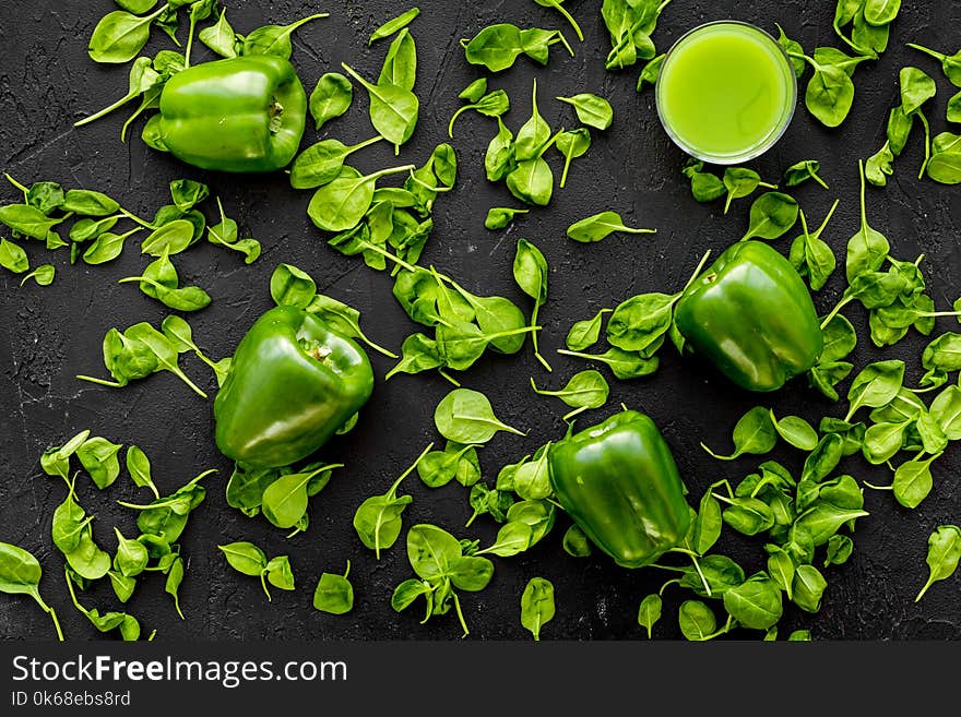 Fitness greeny drink with vegetables on dark background top view mock-up