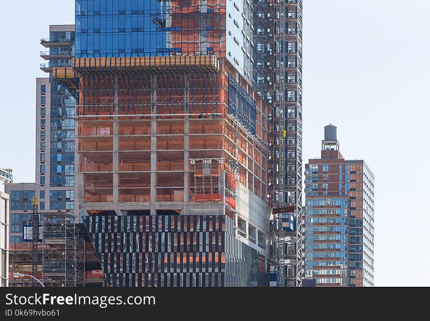 Street perspective New Yorker buildings. Facade of skyscrapers during construction, New York, USA. Street perspective New Yorker buildings. Facade of skyscrapers during construction, New York, USA