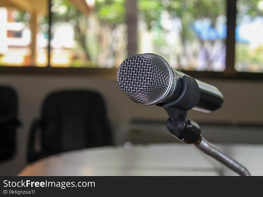 Close up of Microphone in conference room blur Background