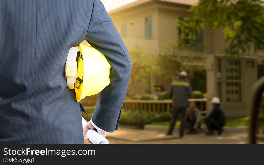 Double exposure Engineer with safety helmet on construction site workers