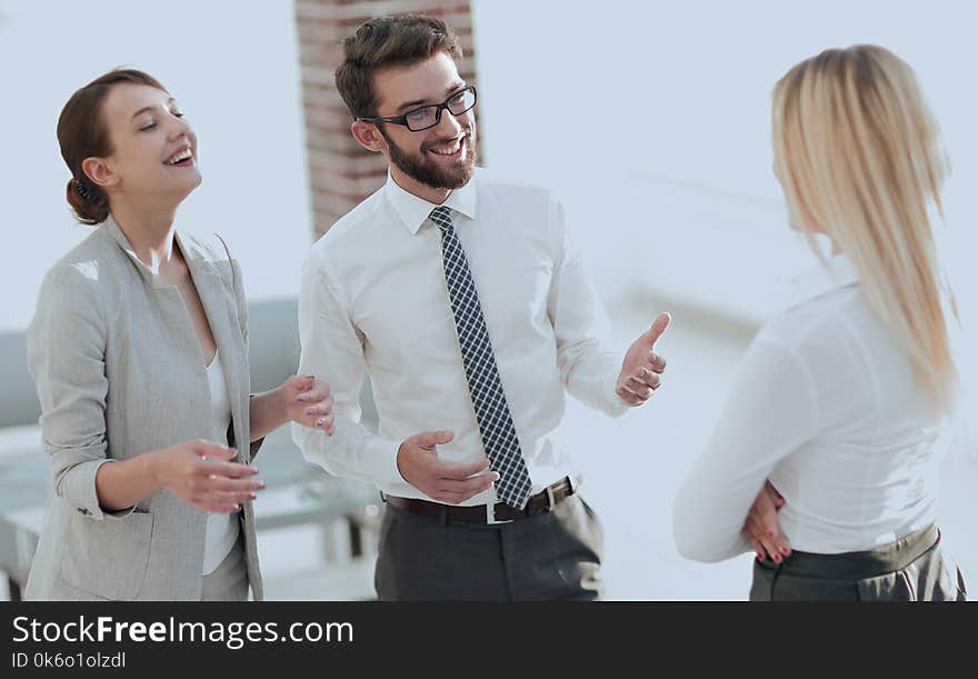 Manager And Business Team Talking In The Office.