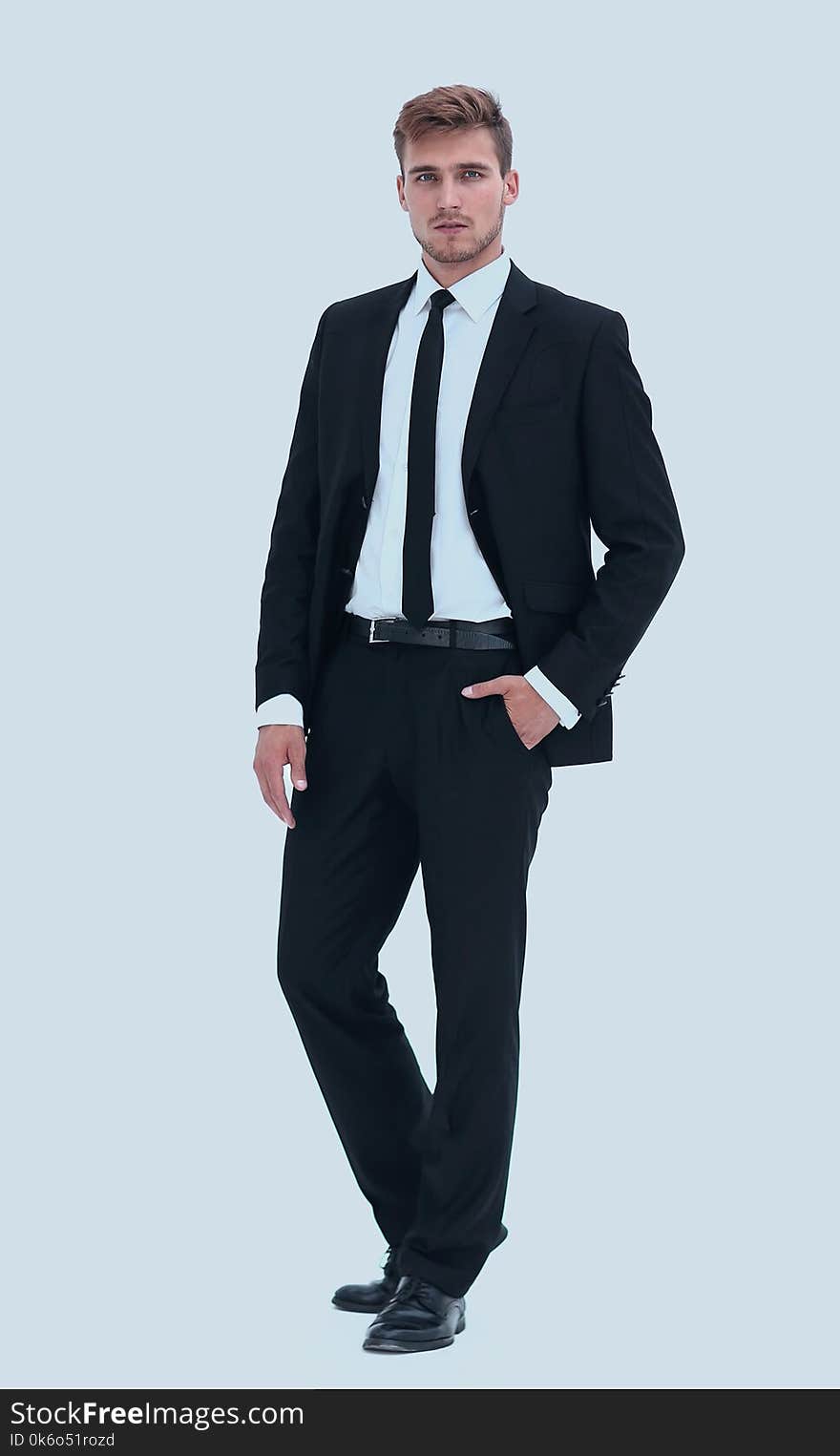 Portrait in full length of confident businessman. isolated on a white background.