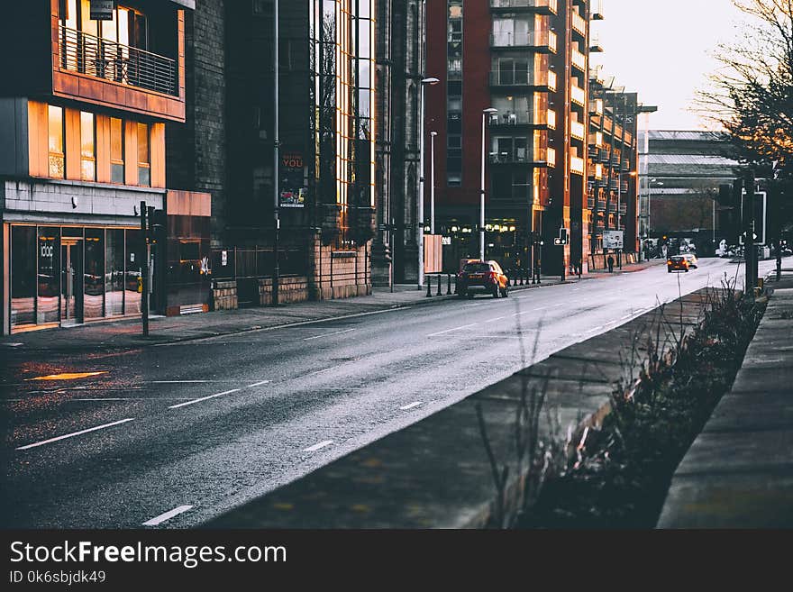 Photography of Roadway Near Buildings