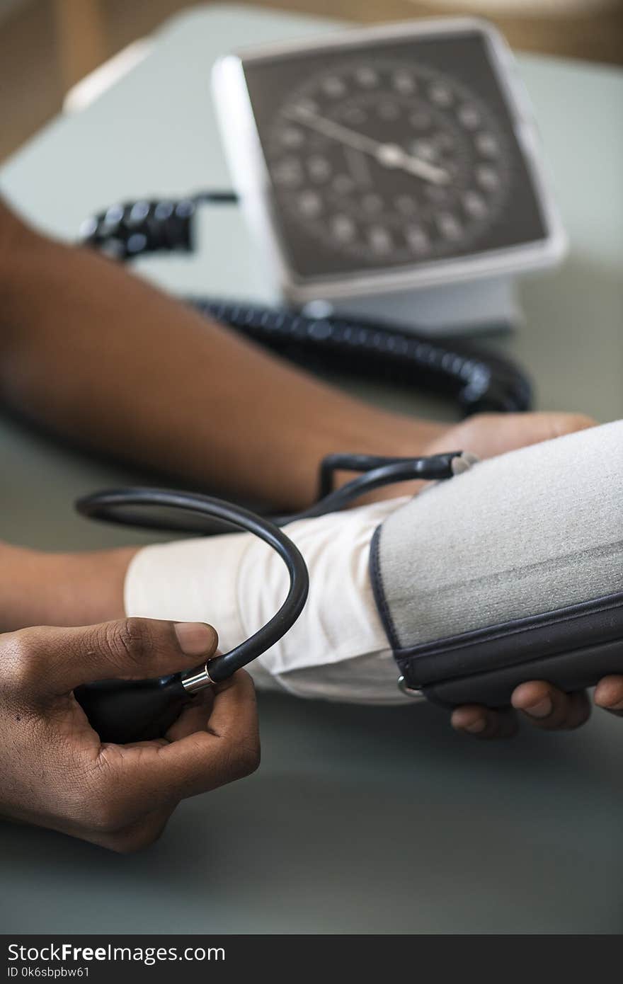 Person Taking Blood Pressure