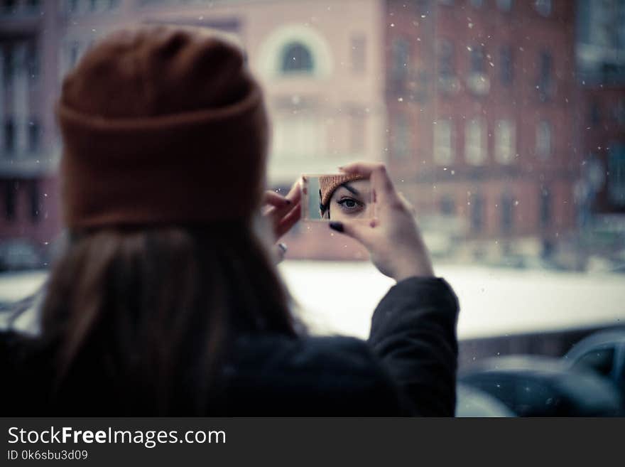 Woman Wearing Brown Knit Cap