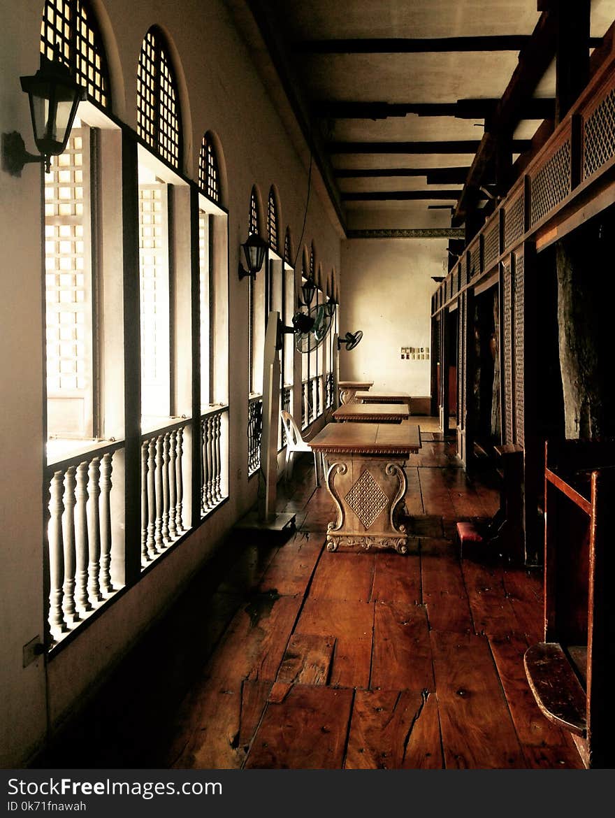 Two Brown Wooden Tables