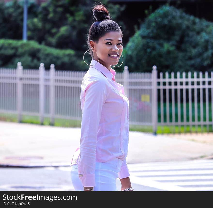 Woman in Pink Long-sleeved Blouse