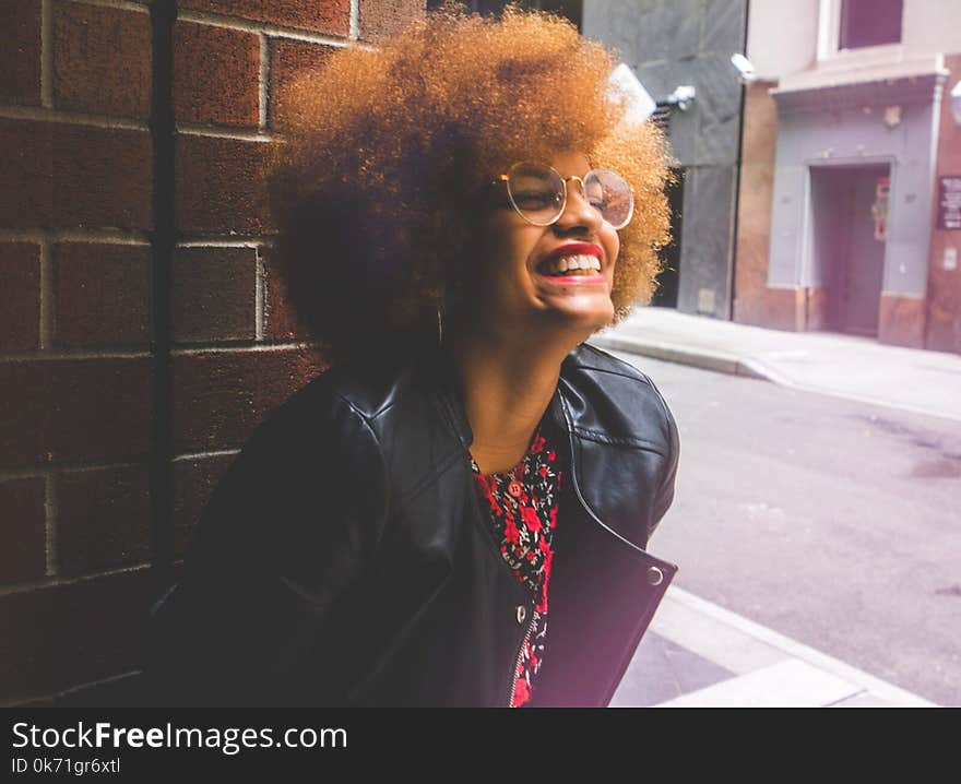 Woman Wears Black Leather Jacket