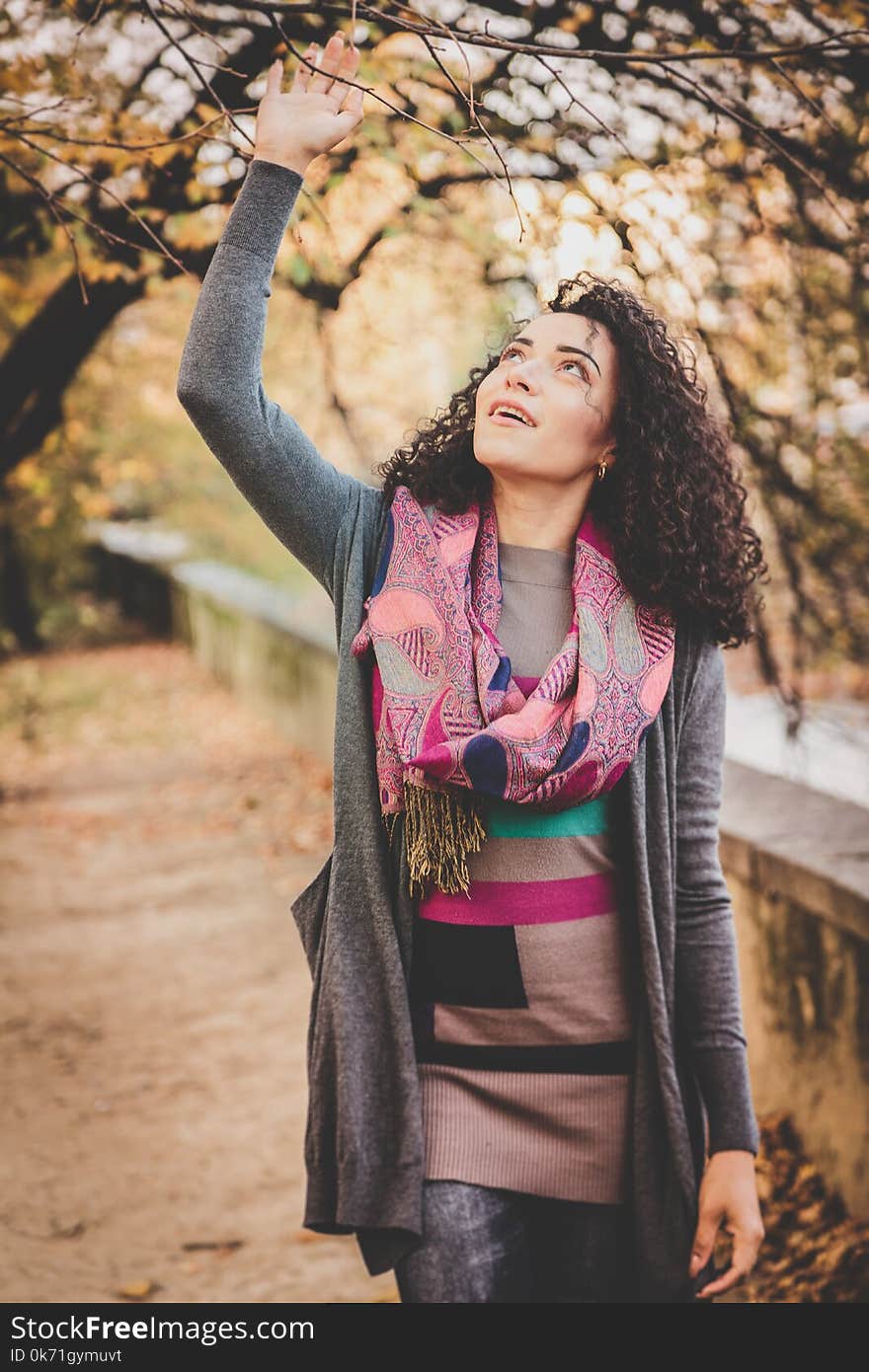 Person Wearing Gray Cardigan Looking Up