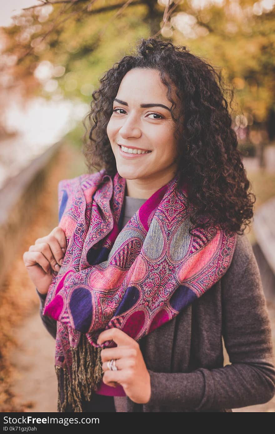 Woman Wearing Pink Infinity Scarf