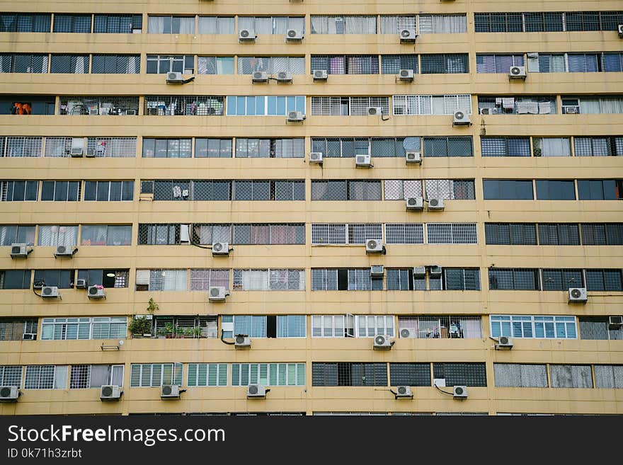 Grey and Brown Building With Air Condensers