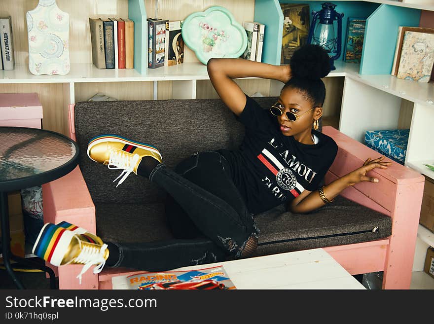 Photo of Woman Laying on the Couch