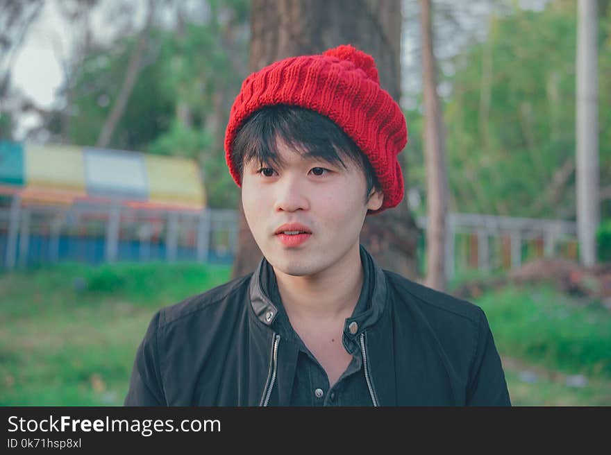 Man Wearing Red Knit Cap