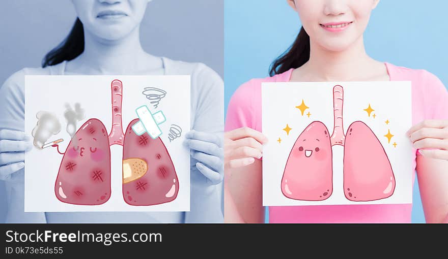 Woman take lung billboard with health concept on the blue background