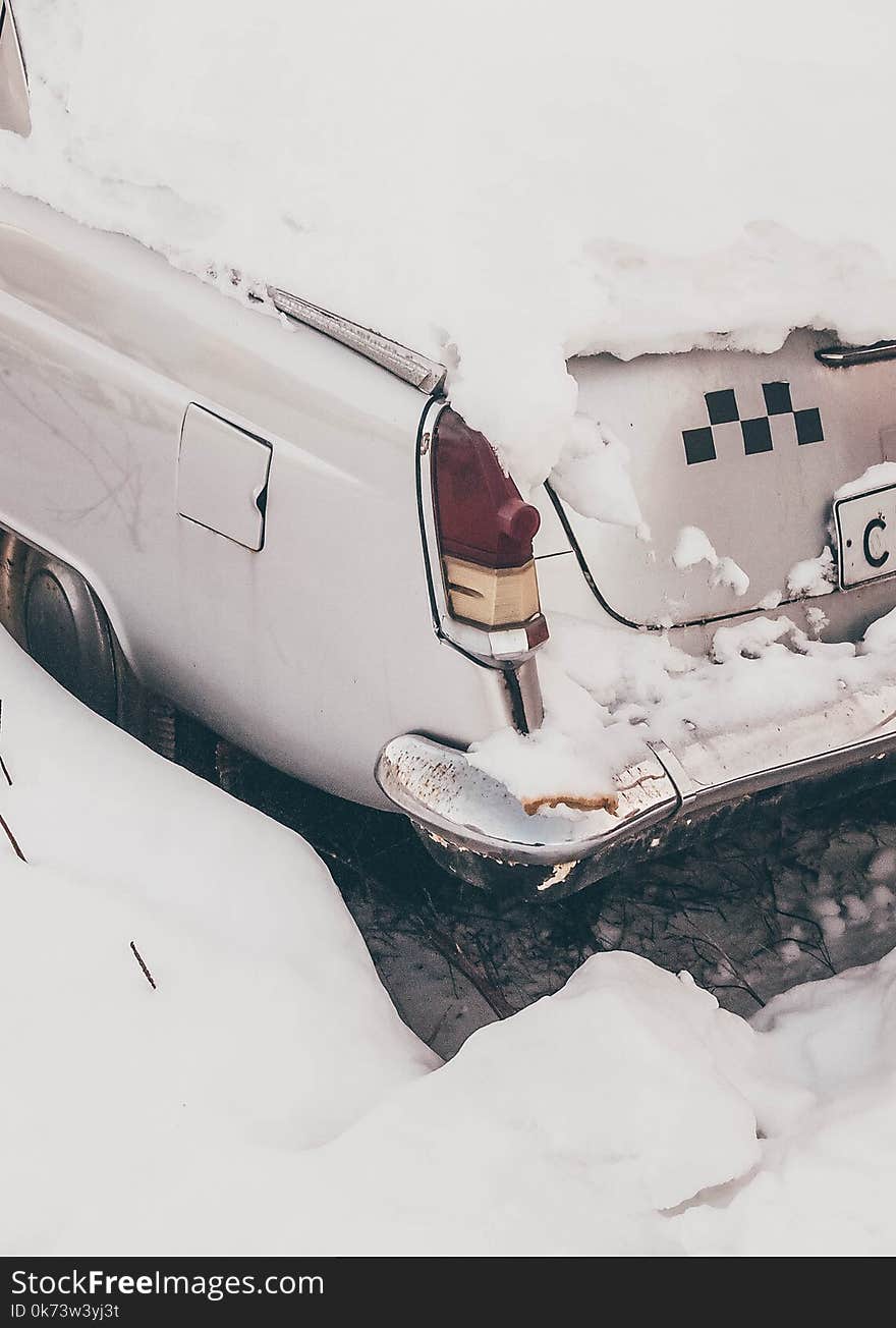 White Car Covered With Snow