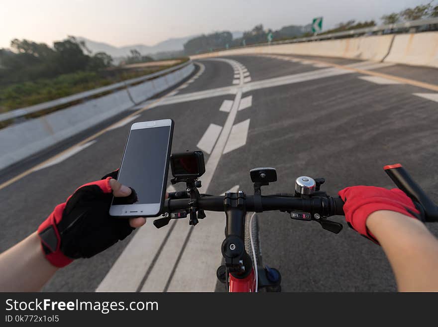 Cyclist Using Smartphone For Navigation