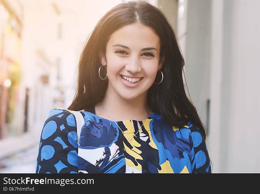 Portrait of young beautiful woman. Outdoors. Urban concept. Portrait of young beautiful woman. Outdoors. Urban concept.