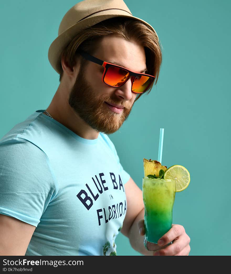 Young Man In Hat Drinking Margarita Cocktail Drink Juice Happy Looking At Camera