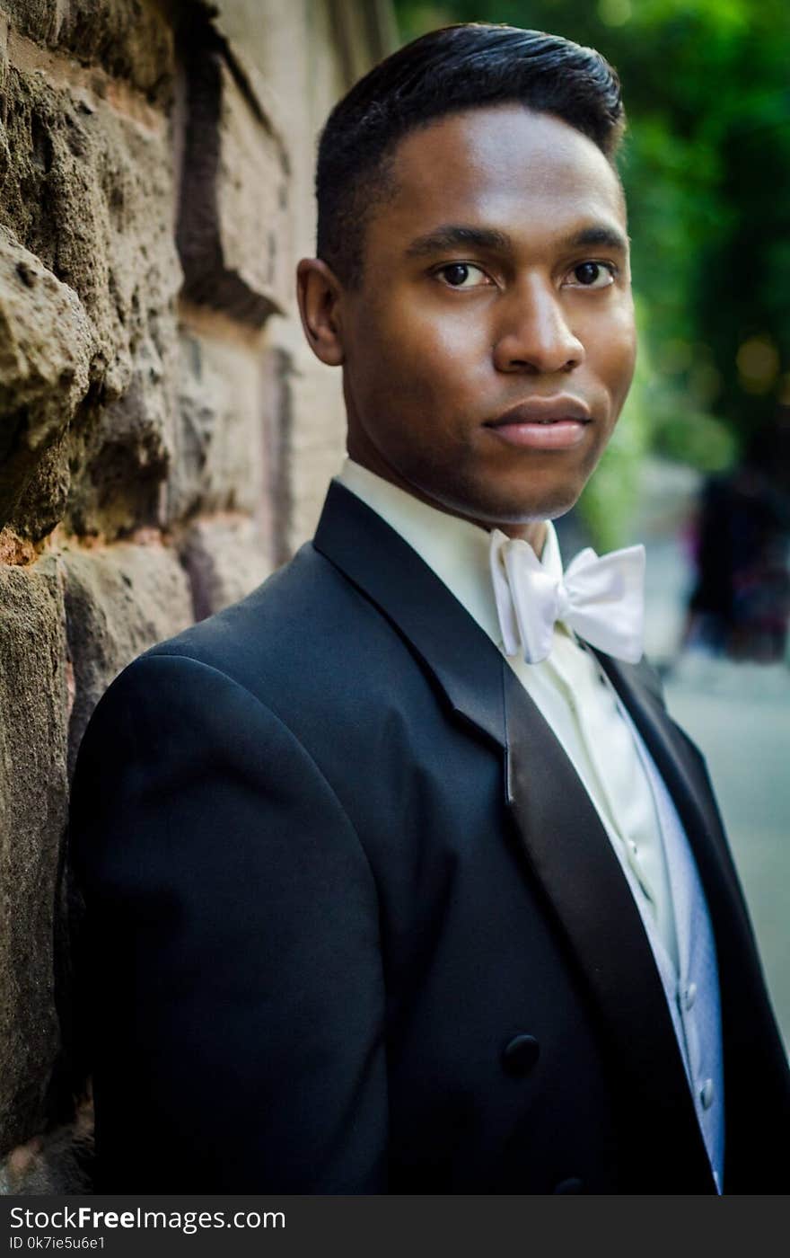 Selective Focus Photography of Man in Black Suit