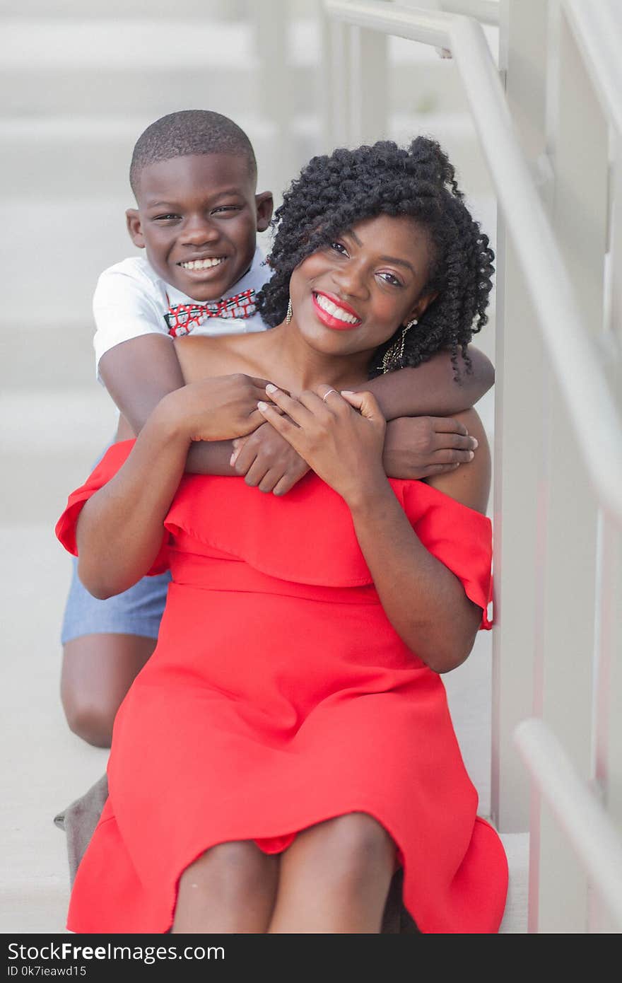 Photo of Boy Hugging His Mom